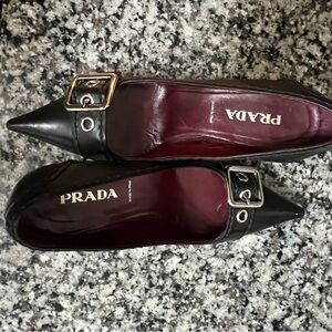 Prada  leather pointed toe kitten heels with silver buckle